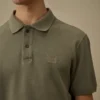 24/1 piqué, pigmentgeverfde polo met korte mouwen