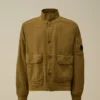 Bomberjack met gebroken twill-patroon aan de lens
