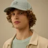 Gabardine-pet met logo