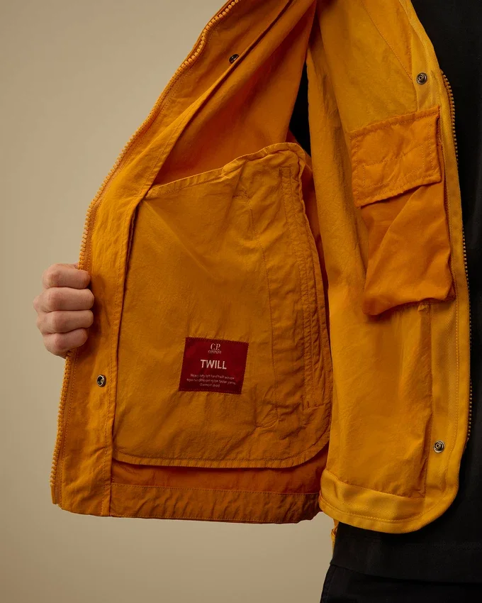 Twill-jas met capuchon en Lens-luik