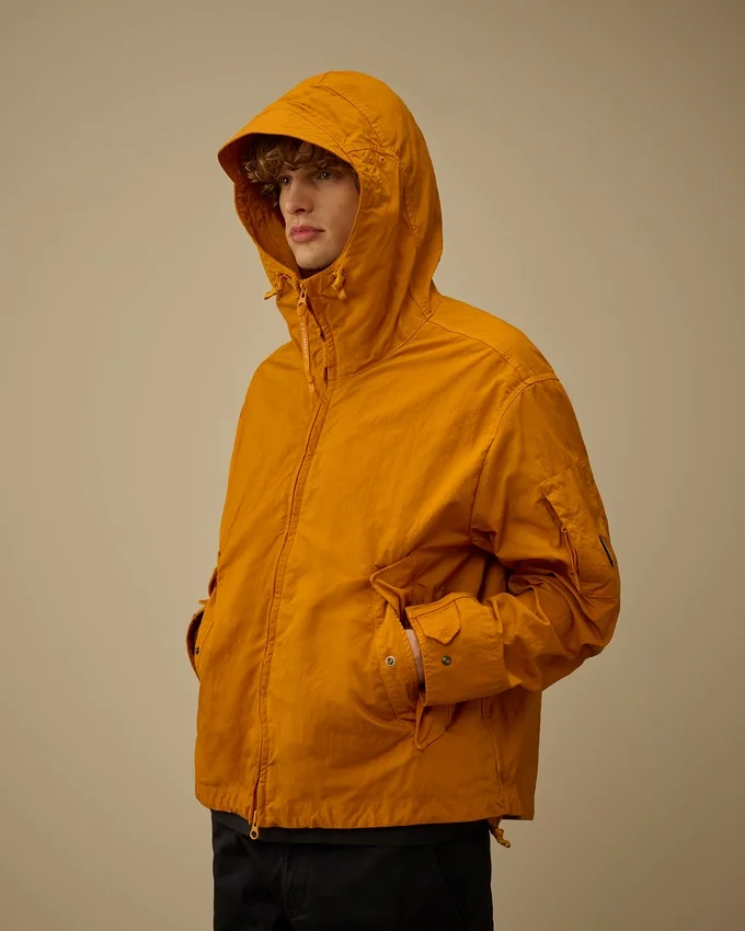 Twill-jas met capuchon en Lens-luik